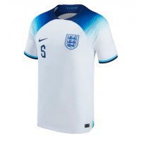 Camisa de Futebol Inglaterra John Stones #5 Equipamento Principal Mundo 2022 Manga Curta